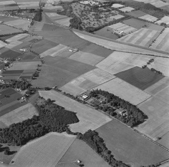 Oblique aerial view from NE.