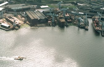 Oblique aerial view of Greenock, Scott Lithgow Shipyard, taken from the NNE.