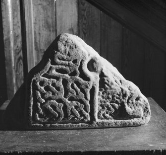 View of rear of cross slab fragment from Lothbeg, now in Dunrobin Museum.