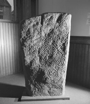 View of face of the Ulbster Stone Pictish cross slab in Thurso Museum.