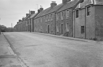 General view of buildings on the north side of Drummond Street, Muthill,
