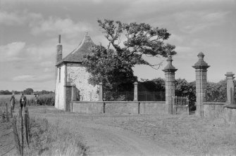 View of W gates and N lodge, Letham House, from S.