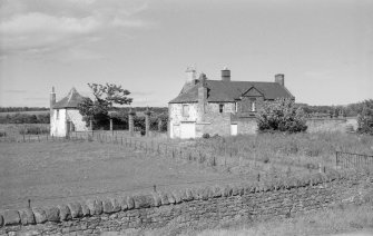 View of Letham House showing gatepiers and lodge.