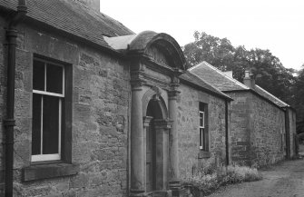 View of pedimented entrance to stable block.