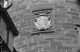 Detail of coat-of-arms in tower wall.