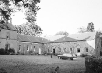 View of yard and groom's house from SW.