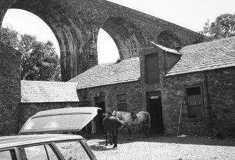 View of steading courtyard and viaduct from N.