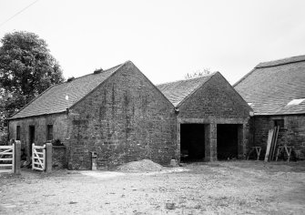 View of farmhouse's single storey wing from W.