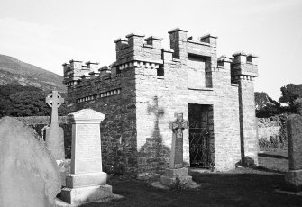 View of burial vault in graveyard.