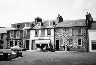 General view of nos. 19, 20, 21 North Main Street from SSE.