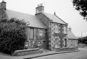 View from south west of Crombie House and adjoining house and shop