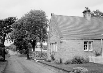 General view of gatepiers and lodge