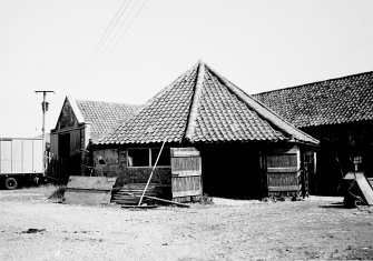 View of horsemill and other farm buildings