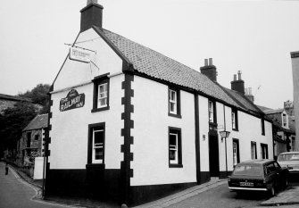 View from south west of 'The Railway Inn' and 'Lea Rig'