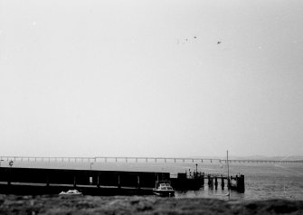 View of Ferry Pier with Tay Rail Bridge in the distance.