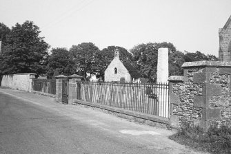 General view from adjacent road of churchyard.