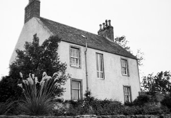 General view of rear of house.
