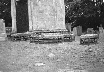 General view of churchyard including four mortsafes.