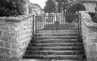 View of stair leading up to churchyard.