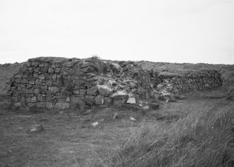 General view of remains of building.