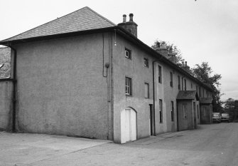 View of N elevation of steading from E.