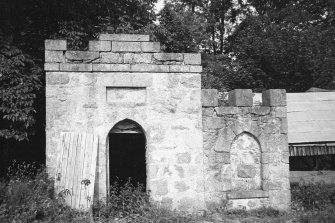 View of ruined outbuilding.