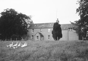 View of farmhouse from SW.