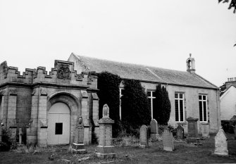 View of north elevation of church, east Seafield Mausoleum, and gravestones