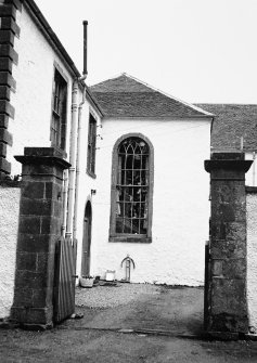 View through gateway into yard