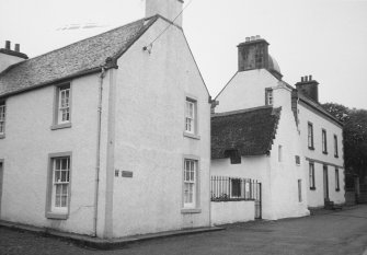 General view of Church Street including Hugh Miller's Cottage and Miller House and The Paye, Paye House.