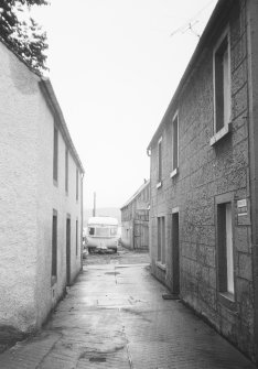 General view down alley between Nos 60 and 62 Church Street