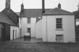 General view of farmhouse from SW.