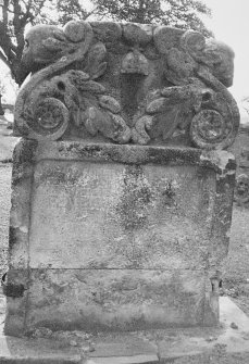 Detail showing gravestone.