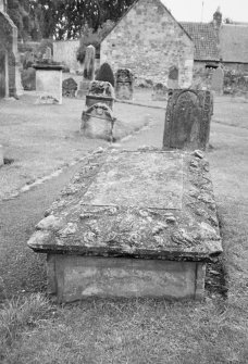 View of table tomb and other gravestones.
