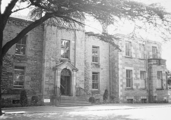 General view of the front facade including the entrance seen from the North East.
