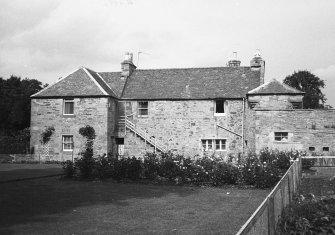 View of farmhouse from SE.