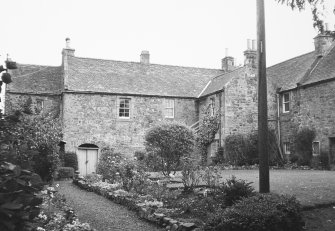 View of farmhouse from NW.