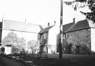 View of farmhouse from NW.