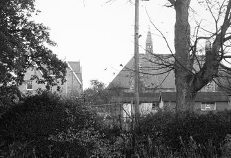 Distant view showing Woodend Free Church and Norwood.