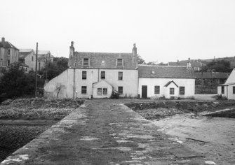 Jura, Craighouse, Store Houses & Shop.
General view from East.