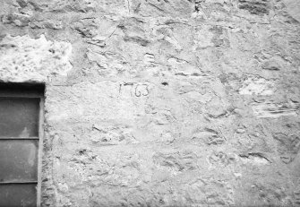 Detail of date 1763 carved in wall.