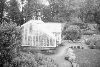 General view showing greenhouse.