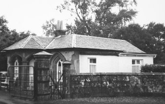 View of lodge and gate pier.