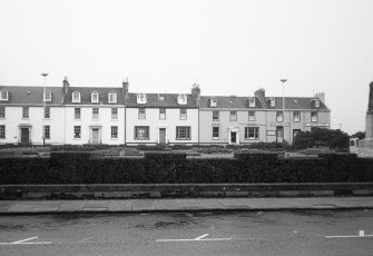 General view from N of nos. 16 - 24 Wellington Square.