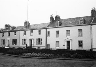 General view of nos. 22-24 Wellington Square from N.