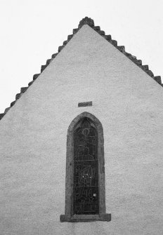 View of upper part of E gable.