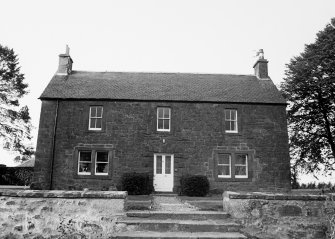 View of South elevation of farmhouse.