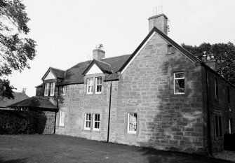 View of West elevation of farmhouse.