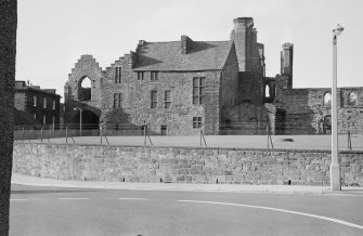 View of Abbot's House and pend, Arbroath Abbey, from SW.