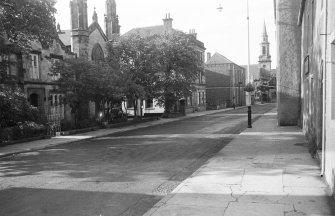 General view along High Street, Banff, showing St Andrew's Episcopal Church and adjacent vicarage, St Mary's Parish Church and Public Library.